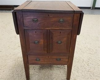 1151	ANTIQUE LIFT TOP DROP LEAF COMMODE, HAS A MIRROR UNDER THE COVER, 2 DRAWERS, 2 DOORS, 22 1/4 IN WIDE X 21 1/4 IN DEEP X 31 3/4 IN HIGH, DROPS ARE 8 1/2 IN
