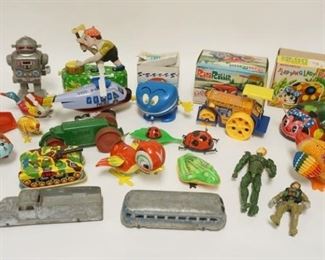 1219	LOT OF MISC. TOYS INCLUDES TOOTSIE TRUCK & BUS, 3 IN ORIGINAL BOXES, TIN BANK ETC. 
