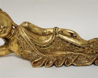 1225	CARVED GILT & JEWELED ASIAN RECLINING FIGURE 16 IN L 
