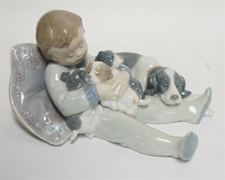 1233	LLADRO CHILD W/ DOG & PUPPIES 6 3/4 IN X 5 1/2 IN, 4 IN H
