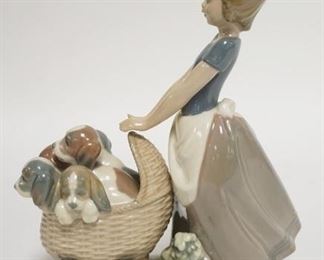 1242	LLADRO GIRL W/ CARRIAGE OF PUPPIES 8 3/4 IN H 
