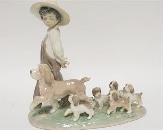 1249	LLADRO *MY LITTLE EXPLOYERS* BOY W/DOG & PUPPIES, 10 IN WIDE X 10 1/4 IN HIGH

