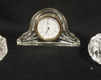 1266	3 PIECES WATERFORD CRYSTAL CLOCK & 2 ASHTRAYS, CLOCK IS 6 3/4 IN WIDE
