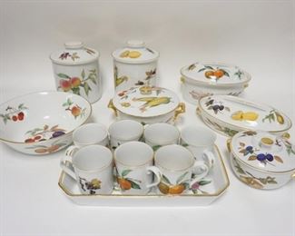 1282	15 PIECE ROYAL WORCESTER EVESHAM, 2 CANNISTERS, 3 COVERED SERVING BOWLS, 10 IN OPEN SERVING BOWL, 7 MUGS & A TRAY, 13 1/2 IN X 7 1/2 IN, COVERED PIECE W/GOLD HANDLES HAS A CHIP
