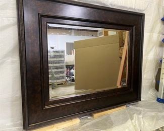 Huge & heavy solid wood framed mirror. A stately addition to any room. Measures 58" x 44" can be mounted vertically or horizontally. $350.