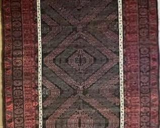 6' x 11' vintage Mushwani Baluch rug. Clean and in great condition.
