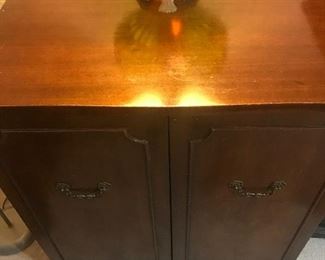 2 Door Wood Cabinet 
38”(h) and 33” (l)