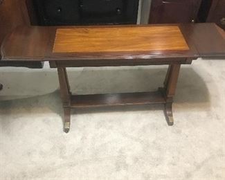 Drop leaf table with wheels for ease of motion!
Measures 55”(l) fully extended and 26 (h)
35” not extended
