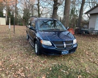 2002 Dodge Caravan. Overhauled with complete wheelchair lowered floor conversion using the one touch system. This van is immaculate! Great shape. Mileage is in one of pictures.  We are taking bids!