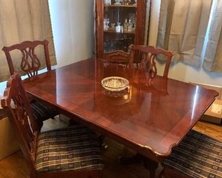 Beautiful mahogany dining table with four chairs