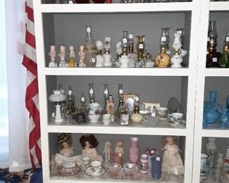 Antique oil lamps and bottles