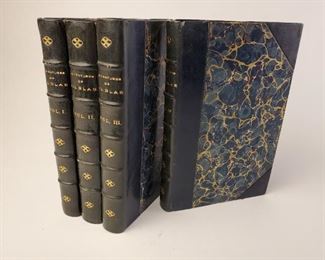 1896 illustrated 4 volume set The Adventures of Gil Blas of Santillana by Lesage. Translated by Henri Van Laun. Photogravures Illustrations by AD Lalauze. Gibbons and Company / J B Lippincott. Approximately 7-⅛" by 4-⅝" marbled covers in green and gold.