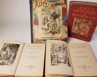 4 illustrated volumes by Lewis Carroll. Includes 1922 Through the Looking Glass Macmillan Co, 1923 Alice's Adventures in Wonderland Macmillan Co, Alice's Adventures in Wonderland Frederick A Stokes color illustrations no copyright date does have a gift inscription of 1909 in front.  Large volume is Alice in Wonderland and Through the Looking Glass McLoughlin Brothers New York also no copyright date possibly early 20th century. Large volume approximately 10-½" by 8-¾" smallest is approximately 7-¾" by 5-¼"