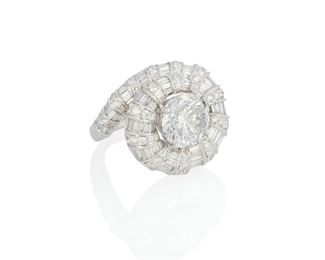 1009
A Diamond Ring
18k white gold
Centering a full-cut round diamond graded I-J color and I clarity, further set with small round and baguette-cut diamonds totaling 3.25cts. and graded H-I color and VS-SI clarity
Ring size: 7.5
11.4 grams
Estimate: $18,000 - $25,000