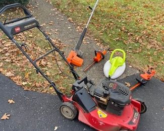 A Toro Super Recycler Lawn Mower and a Variety of Electric Yard Tools