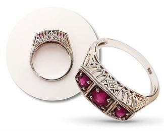 A .925 silver filagree ring with three rubies