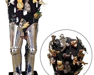 A bizarre armored one-piece tabletop display stand upon which we have chosen to display a selection of brooches; 22"