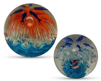 Sea themed paperweights; larger one is 6.5 inches tall