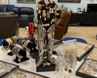 One of the craziest tabletop display pieces we have had. In the single photo, this armored-legged piece looks huge, but it is only 22 inches. We hope someone buys it and all the little brooches on it.