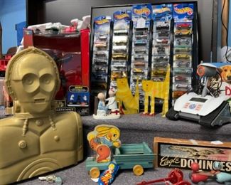 We have lots of toy cars, games and several chess sets.