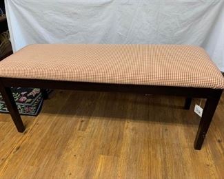  Large Wooden bench with red check pattern cushion