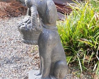 Concrete Dog Statue holding basket of Daisies