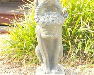 Concrete Dog Statue holding basket of Daisies