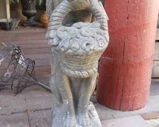 Concrete Dog Statue holding basket of Daisies