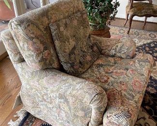 Pair of large swivel club chairs