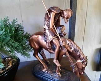 large bronze Indian on horseback