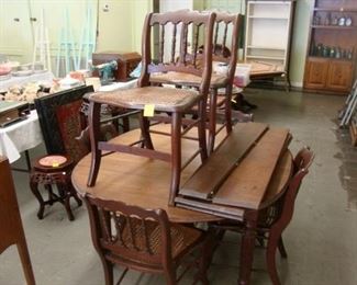 Victorian Walnut dining table and chairs.