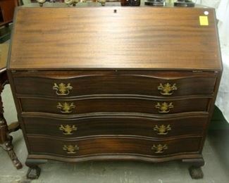 Serpentine mahogany desk.