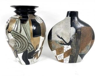 $100      

PAIR OF BLACK WHITE  & BRONZE  AFRICAN TRIBAL DESIGN BLOCK ETCHED CERAMIC VASES 
 
These vintage hand crafted works of tribal art are glazed in black white and bronze geometric color blocking and etched with abstract tribal designs. They are formidable in weight and a beautiful art piece in a cabinet or on a counter space.  They can be used as a mini vase, jar or vessel. 
 
DETAILS:
12"H x 10W x 10D
11.5"H x 10W x 3D
 
Condition: The pieces are in good condition.  There are minor superficial chips pictured commensurate of age and use.  Please refer to photo's for a more detailed look at condition.  We make every attempt to list and photograph any defects or signs of wear that are significant to this sale. 