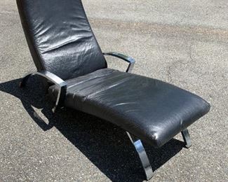 $450      

ITALIAN BLACK LEATHER AND CHROME CHAISE LOUNGE FROM MIKE TYSON'S FORMER ESTATE
 
This contemporary chaise is made of strong, lightweight stainless steel is great for anyone to relax, sit on and read. The subtle curves and substantial presence of classic Italian design is a true delight. The black top grain leather is perfect for adding comfort and style to any room of your home.  This chaise is part of Mike Tyson's private collection from his former estate in Maryland.
 
DETAILS:
40"H x 60"L x 29"W
Seat height 12"
 
Condition:  This piece is pre owned.  It has been well used and the leather has softened but is in good condition. Please refer to photo's for a more detailed look at condition.  We make every attempt to list and photograph any defects or signs of wear that are significant to this sale. 