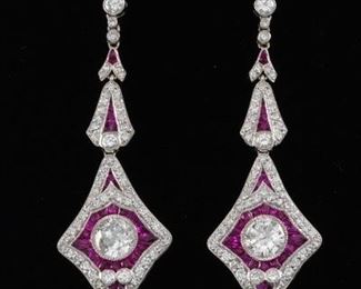 A Pair of 1.52 ct and 1.30 ct Diamond and Ruby Earrings 