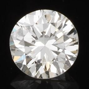 Unmounted 0.98 ct Round Cut Diamond, K SI1, Chip, Fluorescece 