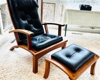 The “Lolling” Chair and coordinating ottoman by Thomas Moser, signed and dated 2001.  This chair has five reclining positions.