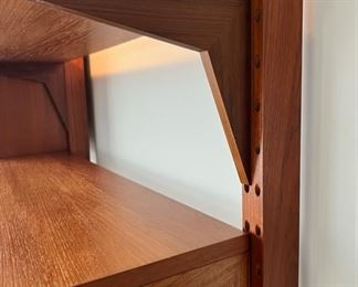 Stunning Danish Modern Poul Cadovius for Cado tension pole four bay wall unit.  This piece is capable of being used as a room divider as there are stay pin holes on the front and back of the tension poles.  As pictured, 130”W x 94”T x 18”D