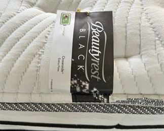 Queen size four post canopy bed with Beautyrest Black mattress set, sold separately 