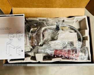 Hansgrohe brushed nickel Logis 70 single hole faucets