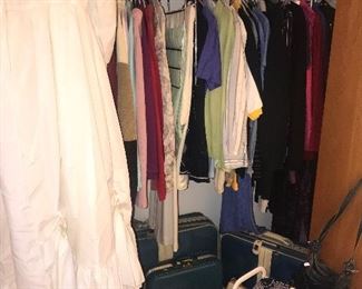 Women’s clothing purses luggage scarves