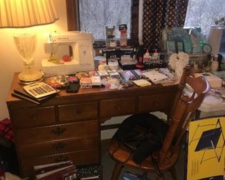 Desk and chair sewing machine office supplies playing cards