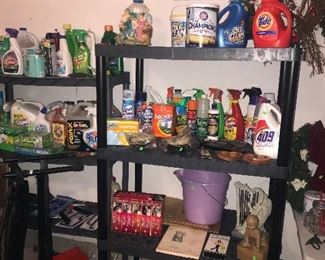 Cleaning supplies garden hose plastic shelves chemicals Keyboard stand