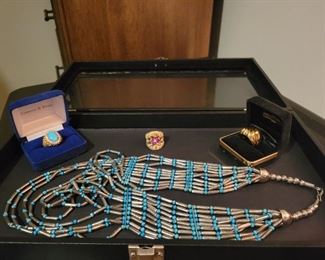 Costume jewelry Necklace and 3 rings cases not included 