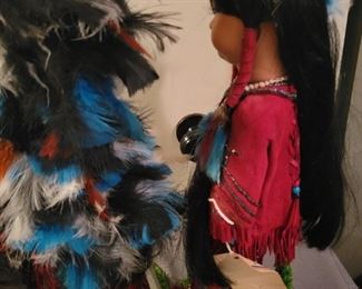 Locally made Porcelain Handmade Native American dolls on stands.