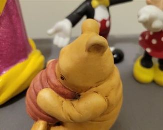Disney pieces including Mickey and Minnie and a classic Pooh by Charpente 