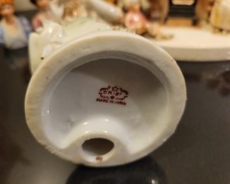 Porcelain figures including "Gorham Lady Taking a Trip" and Avon ladies thimbles, American Remembers Family Reads aloud