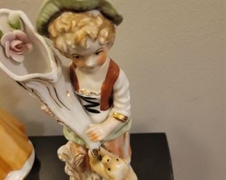 Porcelain figures including "Gorham Lady Taking a Trip" and Avon ladies thimbles, American Remembers Family Reads aloud