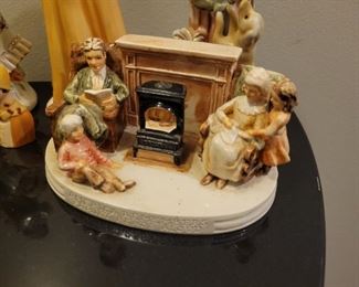Porcelain figures including "Gorham Lady Taking a Trip" and Avon ladies thimbles, American Remembers Family Reads aloud