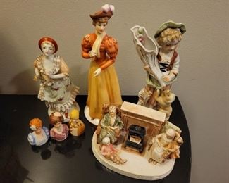Porcelain figures including "Gorham Lady Taking a Trip" and Avon ladies thimbles, American Remembers Family Reads aloud